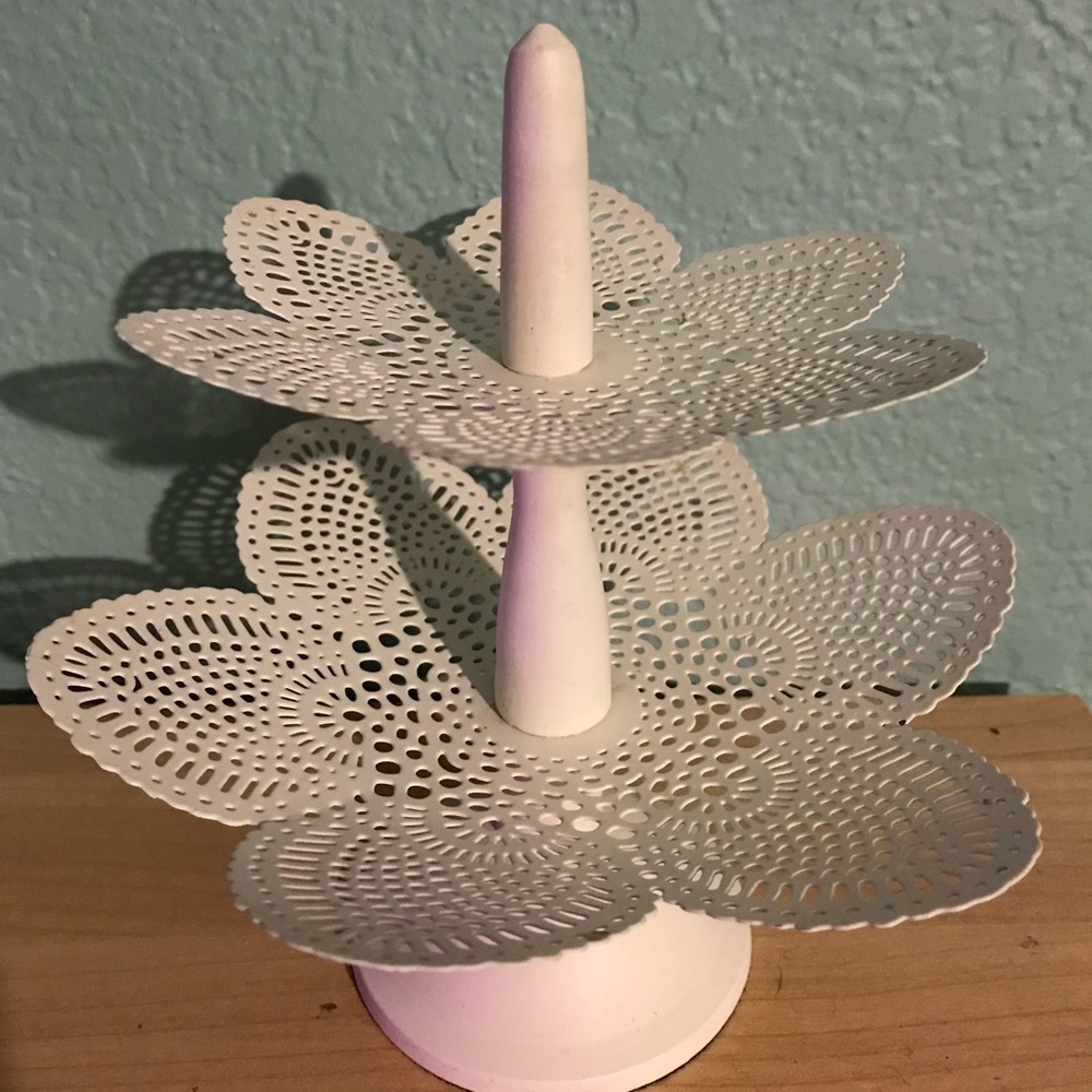 White two shelf jewelry holder.